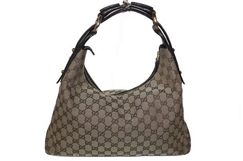 gucci handbag brown|Gucci brown leather shoulder bag.